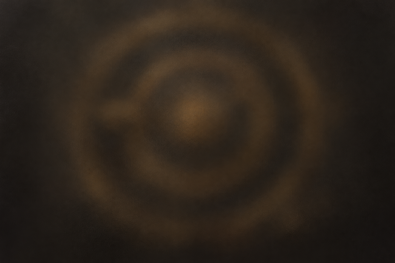 Dark frosted glass teaser obscuring warm brass silhouettes for the unreleased Clockwork Rings game